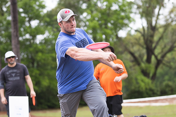 Community member utilizing in the UWF Disc Golf Course