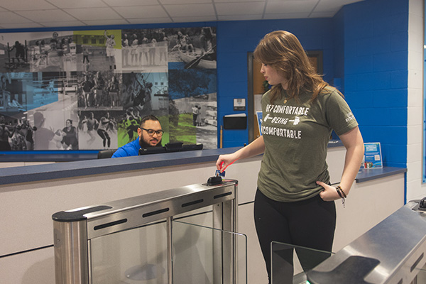 Student checking in to the Rec Center.