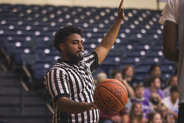 UWF student referee reffing a game.