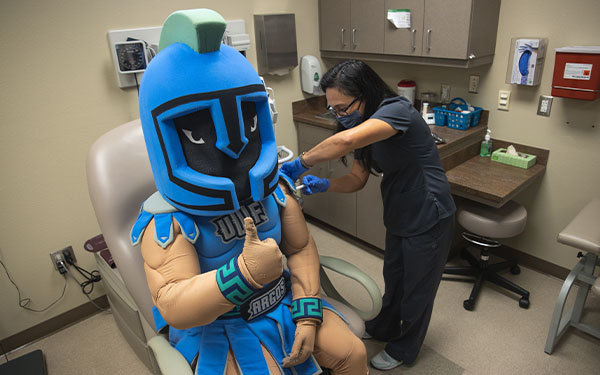 Argie Receiving a Shot