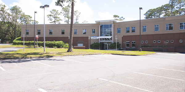 front of building and parking lot building 960