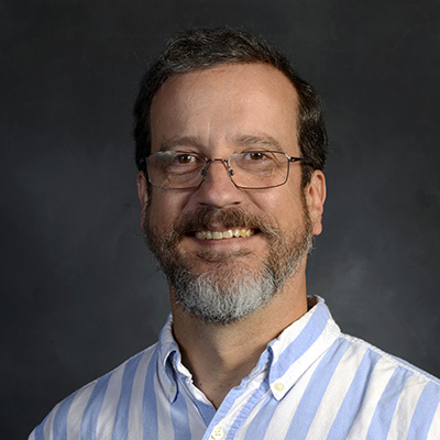 John Worth indoor headshot.