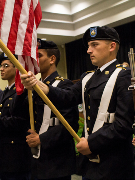 ROTC Student Holding Flag
