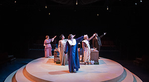 actors performing onstage during a show