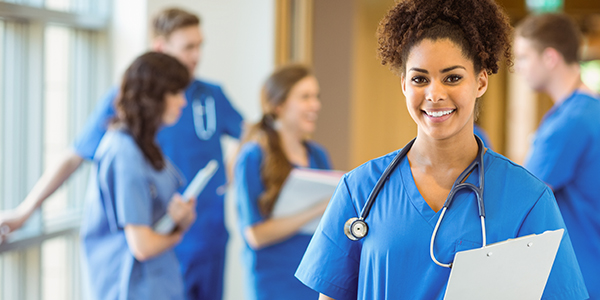 Medical student smiling at camera