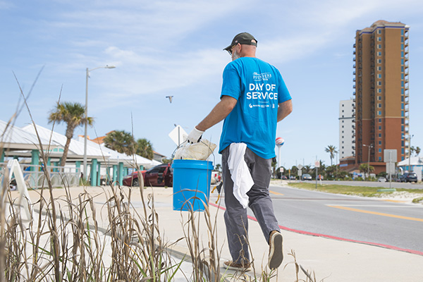 UWF volunteer at beach cleanup.